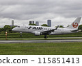 Passenger plane, airplane, J-AIR Embraer 170 landing at Osaka Airport and Itami Airport in the rain 115851413