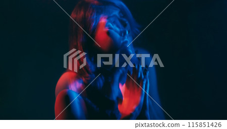 Split mind. Blur woman. Worried pleading silhouette folding hands hoping help neon red blue color dark double exposure out of focus copy space. Split mind. Blur woman. Worried pleading silhouette folding hands hoping help neon red blue color dark double exposure out of focus copy space. 115851426