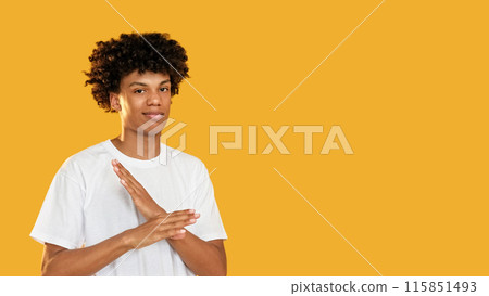 Refusal gesture. Stop enough. Displeased skeptic disappointed guy rejecting with x crossed arms no signal isolated on yellow empty space background. Refusal gesture. Stop enough. Displeased skeptic disappointed guy rejecting with x crossed arms no signal isolated on yellow empty space background. 115851493