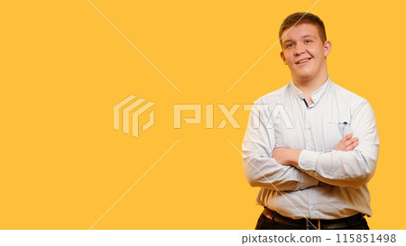 Body positivity. Self confidence. Emotional lifestyle. Cheerful overweight man grinning crossing arms demonstrating irony isolated on yellow empty space background. 115851498