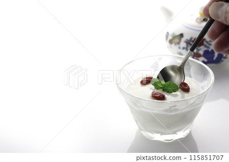 Chinese dessert "Apricot bean paste" garnished with goji berries and mint (white background) Chinese dessert "Apricot bean paste" garnished with goji berries and mint (white background) 115851707