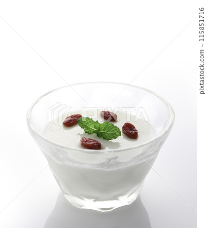 Chinese dessert "Apricot bean paste" garnished with goji berries and mint (white background) Chinese dessert "Apricot bean paste" garnished with goji berries and mint (white background) 115851716