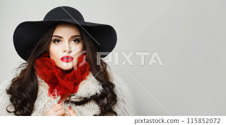 Retro styled young adult woman fashion model with bright make-up and long wavy hair Retro styled young adult woman fashion model with bright make-up and long wavy hair 115852072