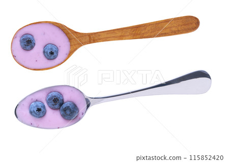 spoon with blueberry yogurt and fresh berries blueberries isolated on a white background. Top view. 115852420