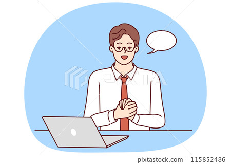 Businessman is sitting at table with laptop and looking at camera recording business training 115852486