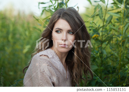 Attractive healthy young model woman with clean fresh skin, natural make-up and curly hairstyle Attractive healthy young model woman with clean fresh skin, natural make-up and curly hairstyle 115853131