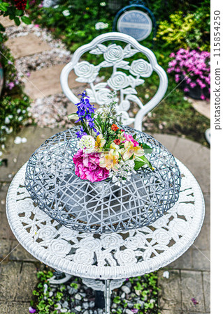 A round object decorated with flowers 115854250