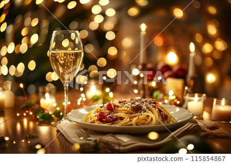 Grated Parmesan cheese on a large plate with linguine, home kitchen, candlelit atmosphere 115854867