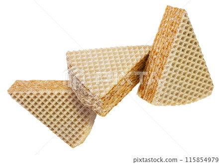 Pieces of wafer cake flying on white background. Isolated 115854979
