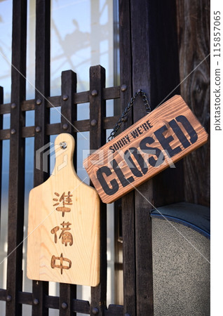 In front of the store preparing to open In front of the store preparing to open 115857065