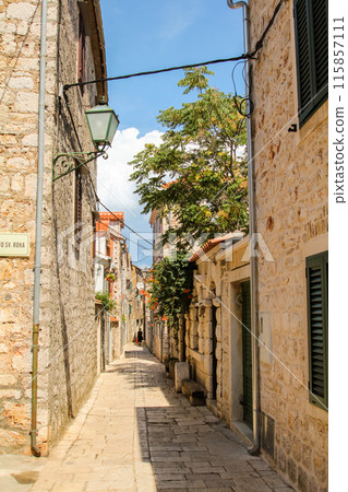 Tranquil narrow little alley in downtown Hvar Tranquil narrow little alley in downtown Hvar 115857111