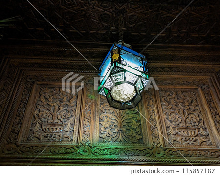 A traditional metal lantern in a palace in the medina of Fes A traditional metal lantern in a palace in the medina of Fes 115857187