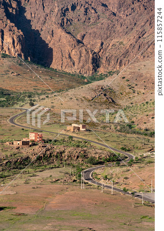 Dwellings in the Tizourgane region, mountains of the Anti-Atlas in the background 115857244