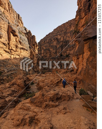 Hiking through the iconic Amtoudi canyon in the Anti-Atlas Hiking through the iconic Amtoudi canyon in the Anti-Atlas 115857255