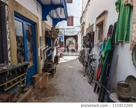 Idyllic alley in the medina of Essaouira, Morocco 115857260