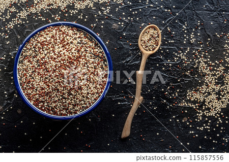 Quinoa mix. Mixed white, red and black quinoa seeds in a bowl Quinoa mix. Mixed white, red and black quinoa seeds in a bowl 115857556