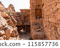 Hiking through the old Id Aissa agadir, an old granary in Amtoudi 115857736