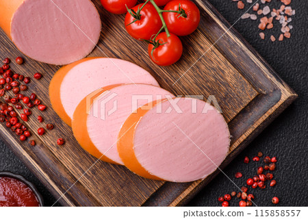 Boiled vegan or vegetarian sausage made from meat substitutes 115858557