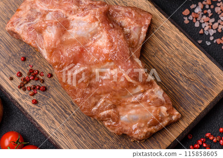 Raw pork or beef ribs in honey sauce with salt, spices Raw pork or beef ribs in honey sauce with salt, spices 115858605
