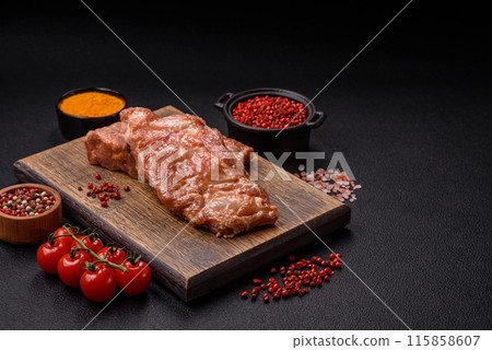 Raw pork or beef ribs in honey sauce with salt, spices 115858607