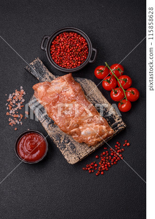 Raw pork or beef ribs in honey sauce with salt, spices 115858628