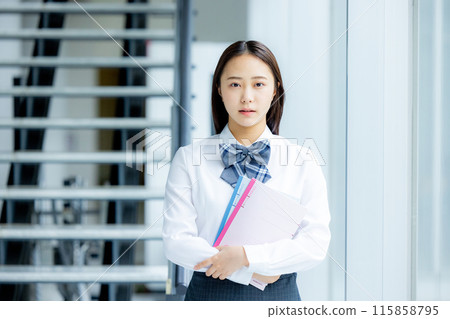 High school girl with notebook High school girl with notebook 115858795