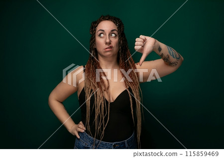 Woman With Dreadlocks Making a Face 115859469