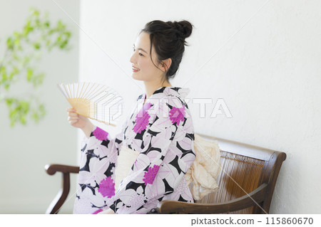 A woman in a yukata A woman in a yukata 115860670