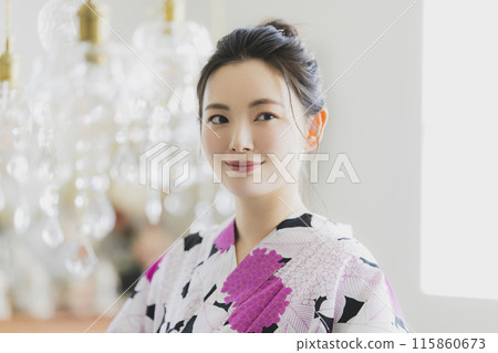 A woman in a yukata A woman in a yukata 115860673