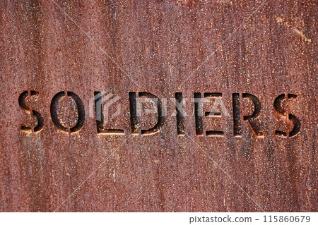 Soldiers word writen on metal plaque Soldiers word writen on metal plaque 115860679