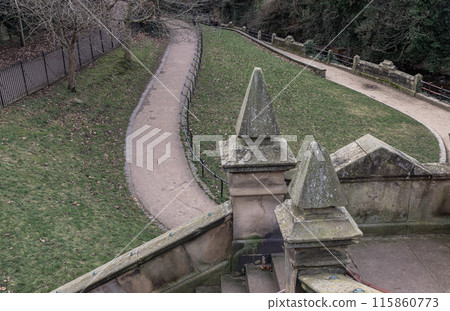 A view of St.Bernards Bridge and Elongated park on the waterfront of The Water of Leith. A view of St.Bernards Bridge and Elongated park on the waterfront of The Water of Leith. 115860773