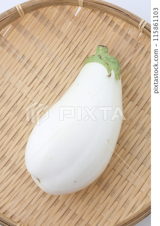 Eggplant on a bamboo basket Eggplant on a bamboo basket 115861103