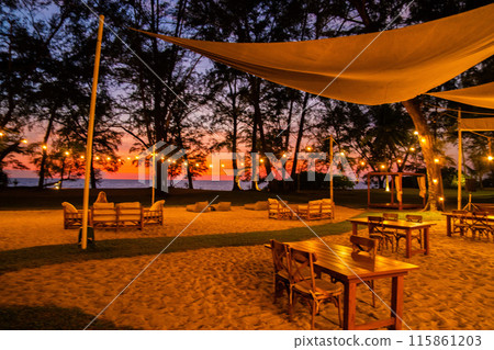 Sunset at the beach bar in Mai Khao Beach Resort in Phuket Thailand 115861203