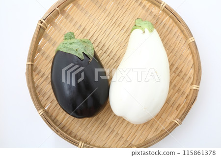 White eggplant and American eggplant on a bamboo basket 115861378
