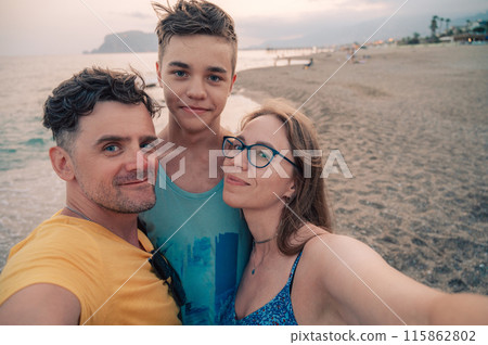 Happy family taking a photo Happy family taking a photo 115862802