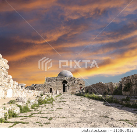 Amman city landmarks-- old roman Citadel Hill, Jordan. Against the background of a beautiful sky with clouds 115863032
