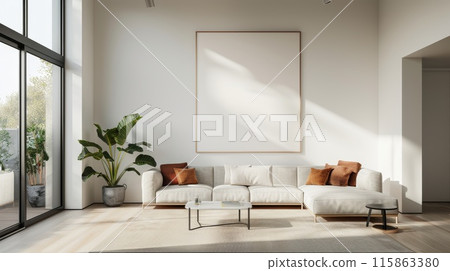 A large white wall with a picture frame and a potted plant 115863380