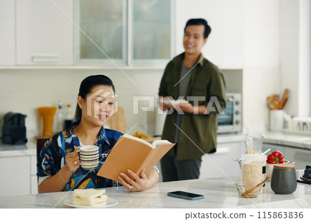 Couple In The Kitchen At Home Couple In The Kitchen At Home 115863836