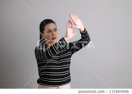 40s Asian Woman 115864096