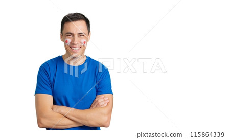 Man standing with japanese flag painted on face smiling Man standing with japanese flag painted on face smiling 115864339