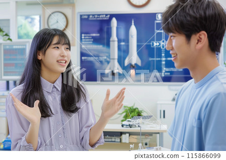 Aerospace students discussing rocket technology_1 Aerospace students discussing rocket technology_1 115866099