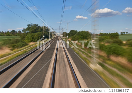 Rails motion blur from moving train Rails motion blur from moving train 115866377