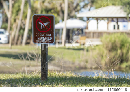 Sign prohibiting use of quadcopters in national park no drone area. Warning notice for using UAV 115866448