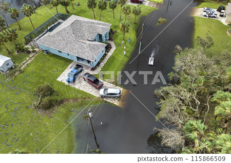 Surrounded by hurricane Ian rainfall flood waters homes in Florida residential area. Aftermath of natural disaster Surrounded by hurricane Ian rainfall flood waters homes in Florida residential area. Aftermath of natural disaster 115866509