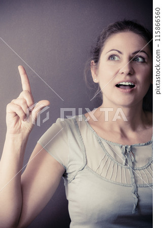 Thoughtful emotional woman in studio Thoughtful emotional woman in studio 115866560