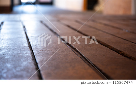 Wooden floor of a store macro shot 115867474