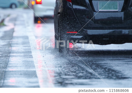 A car splashing water 115868606