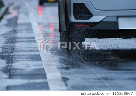 A car splashing water 115868607