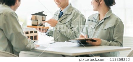 Architects, designers, workers, and engineers having a meeting about a house with a construction company, house maker, construction company, and builder. Architects, designers, workers, and engineers having a meeting about a house with a construction company, house maker, construction company, and builder. 115869233