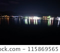 A fishing boat floating in the sea 115869565